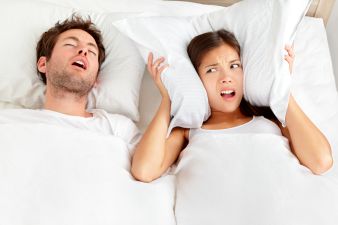 Snoring man Couple in bed