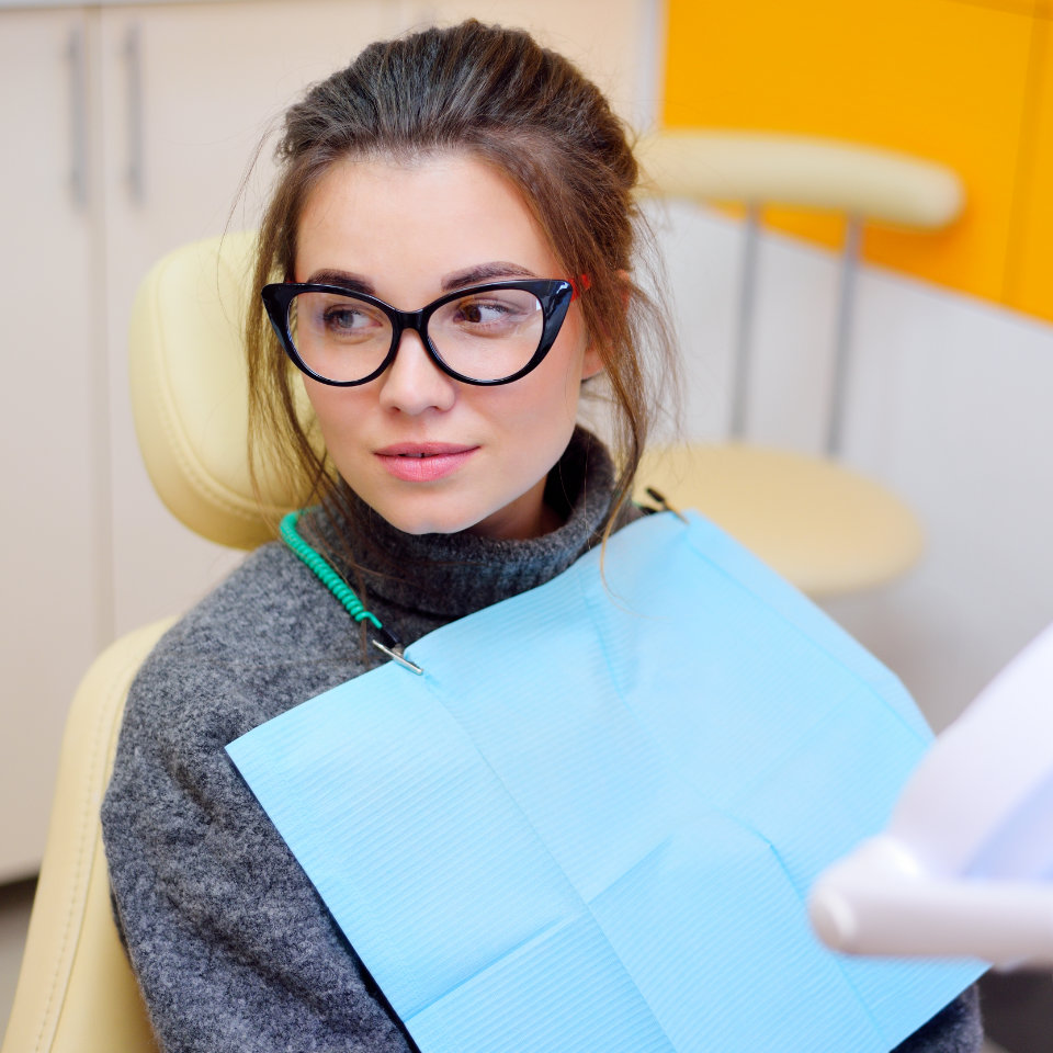 young woman on dental chair