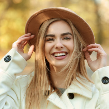 Beautiful smiling woman in hat