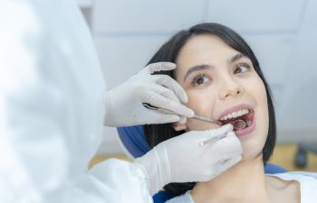 A woman undergoing a dental checkup