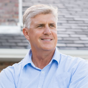 Successful happy retired man Roswell Complete Dentistry patient
