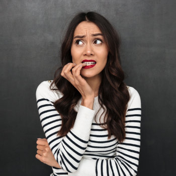 Worried woman dental anxiety Roswell Complete Dentistry care