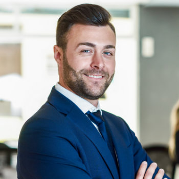 Smiling handsome businessman Roswell Complete Dentistry patient