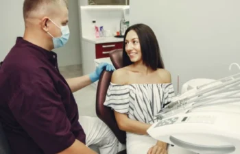 Dentist discussing sensitive teeth whitening treatment plan